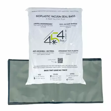 Image of folded 454 Bags BioPlastic bag behind product packaging